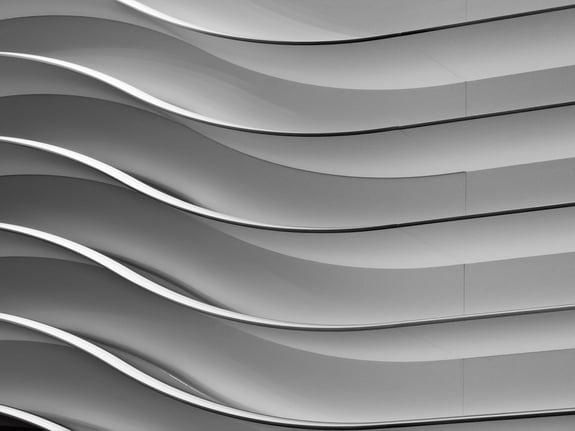 Abstract of interior design in black and white Wavy wall at auto show in public convention center